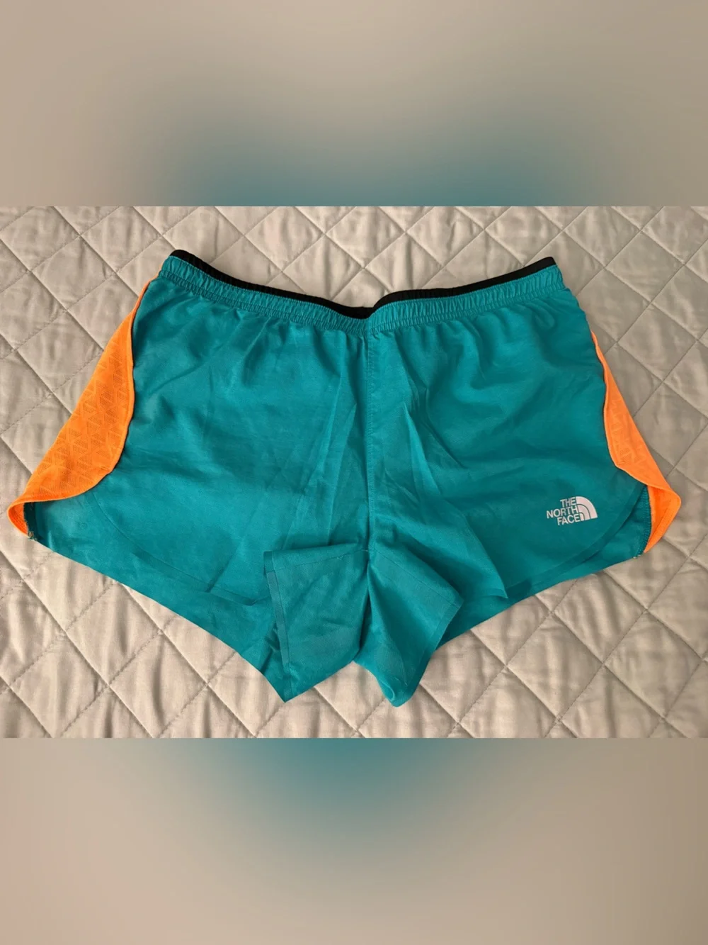 The North Face Teal Running Shorts with Orange Trim